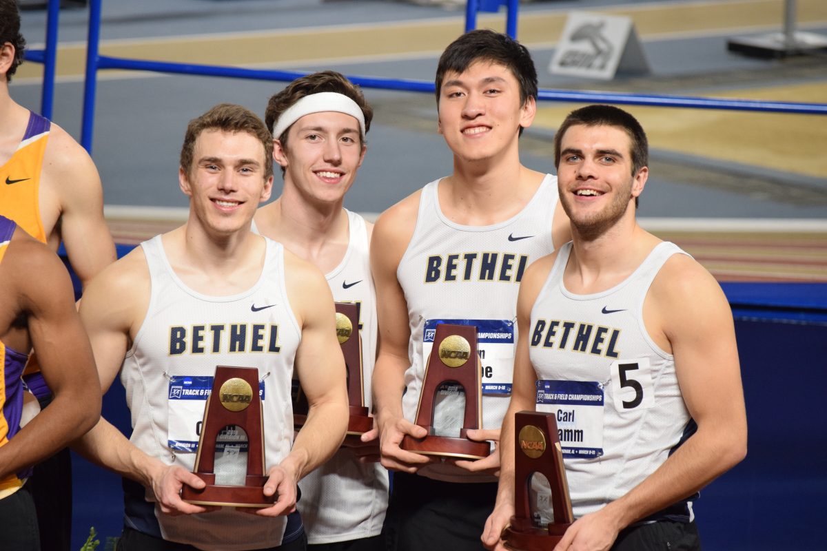 The+mens+4x400m+relay+team+poses+with+their+All-American+awards+at+the+NCAA+Championships+in+Birmingham%2C+Alabama.+%7C+SUBMITTED+PHOTO