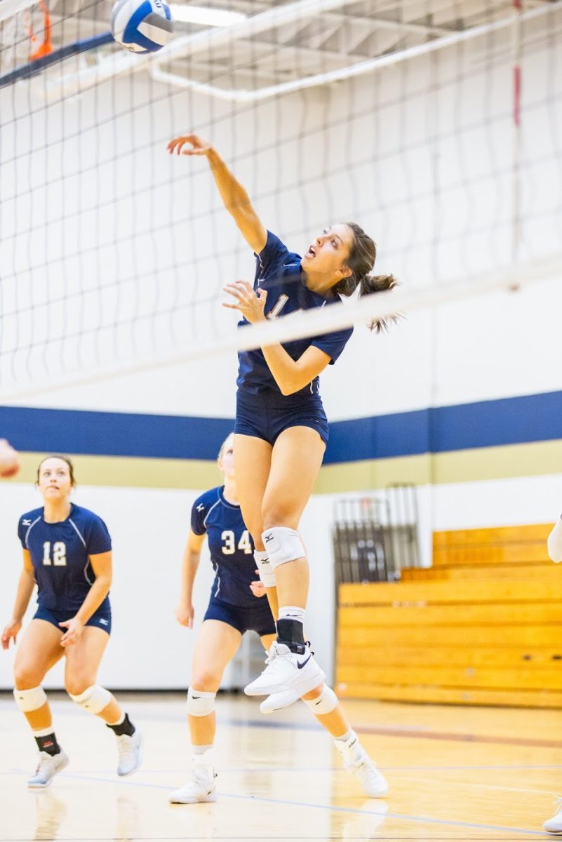 Sophomore+Maria+Claflin+elevates+for+the+kill.+The+Bethel+volleyball+team+hosted+several+teams+over+the+weekend+in+the+Bethel+Invitational+tournament.+%7C+Photo+by+Carlo+Holmberg