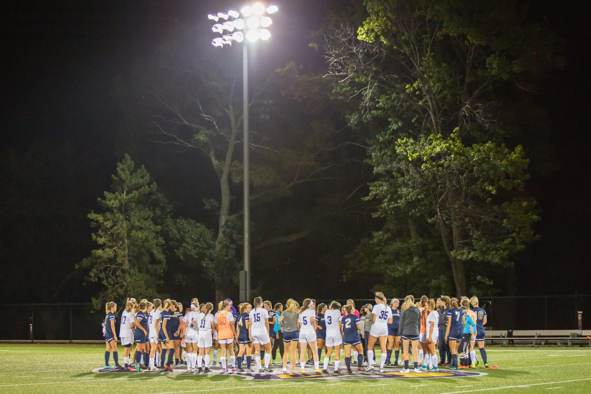 The+Bethel+womens+soccer+team+gathers+at+midfield+with+the+University+of+Northwestern-St.+Paul+after+their+game+Aug.+30.+%7C+Photo+by+Carlo+Holmberg