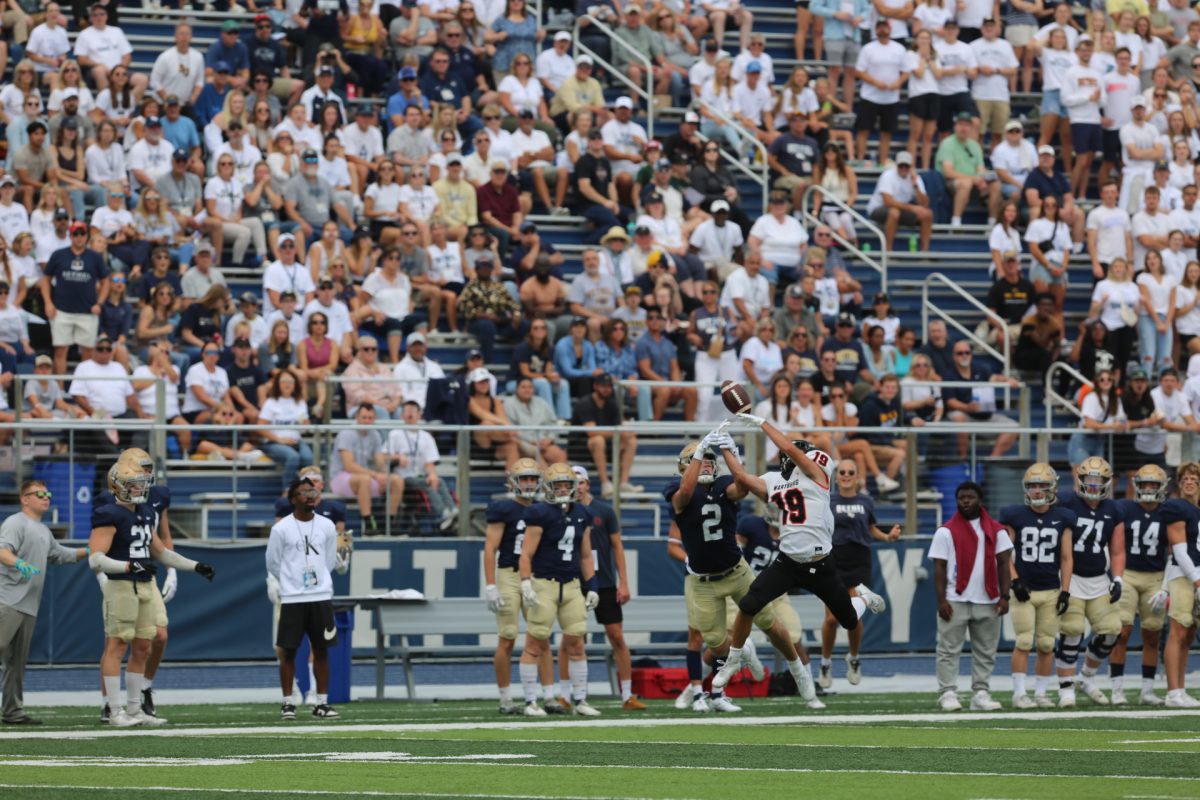 Wide receiver Joey Kidder leaps to catch a ball during Saturday’s game. The pass was incomplete. 