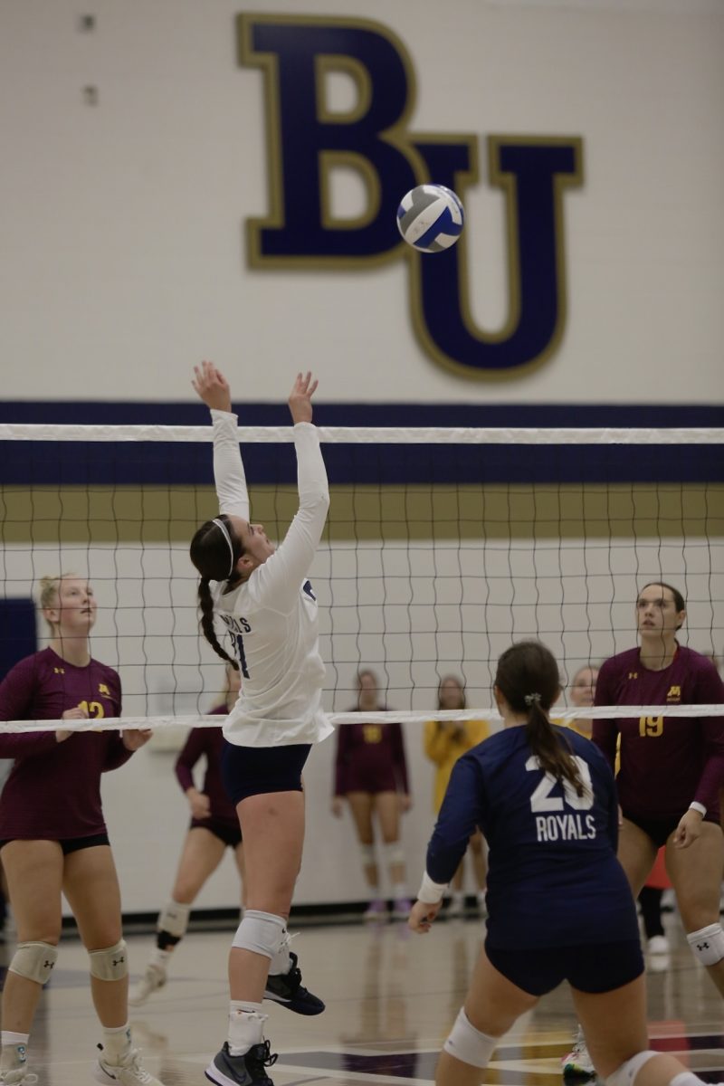 Senior volleyball player Dani Friedges goes up for the block at the volleyball game against the University of Minnesota Morris Wednesday, Sept. 6. “I think the biggest challenge we will face as a team is figuring out what roles everyone is going to fill,” Friedges said.