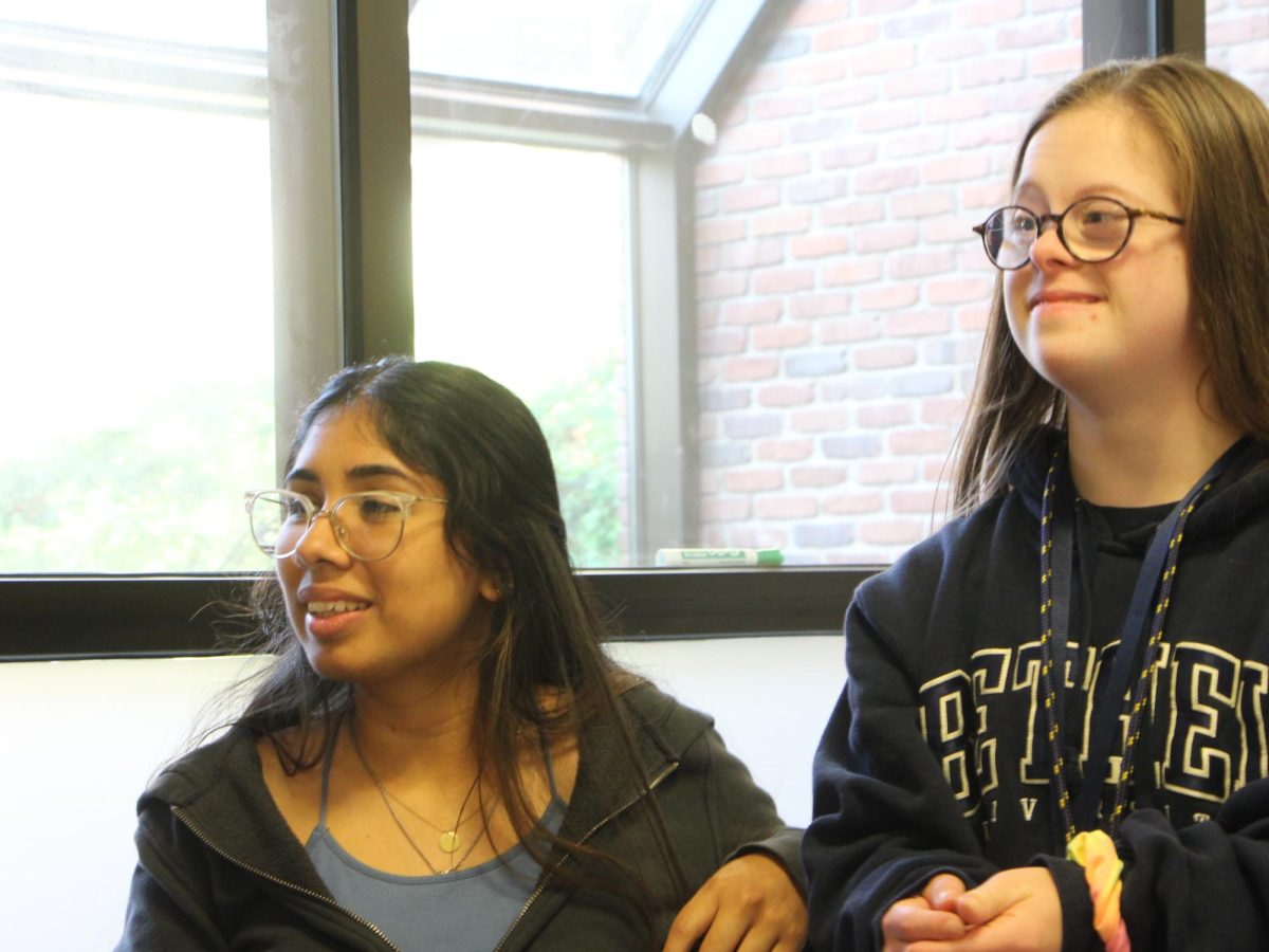 Senior Christina Castañeda sits in the BUILD office alongside first-year student in BUILD Molly Thompson. Next year, Castañeda’s younger sister Cynthia will be joining the BUILD program. “She will make friends wherever she goes,” Castañeda said. “I think she’s excited to gain those friends and that independence.”