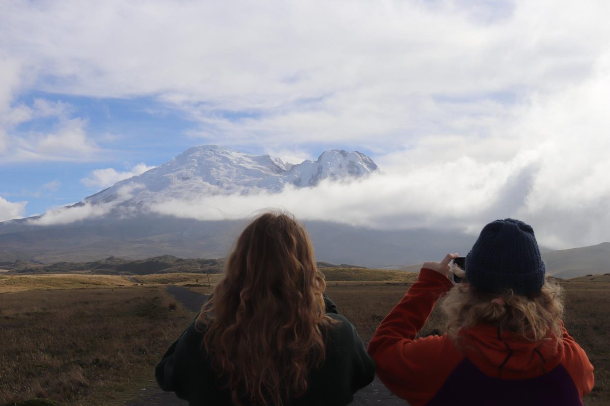 Sophomores+Brookelyn+Huisenga+and+Megan+Crawford+capture+the+Volcano+Antisana+in+awe+during+one+of+their+hikes+in+Ecuador.%0A