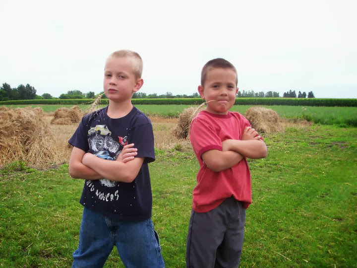 I grew up running around the farm with my brother. Six-year old me (right) and my eight-year old brother liked to put wheat in our mouths like “real” farmers. 