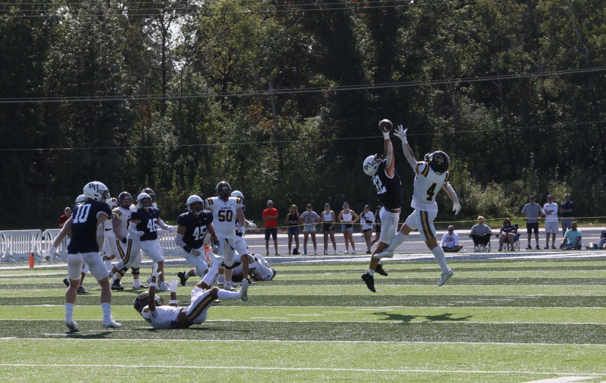 Gavin Rataj bats away a UW-Eau Claire pass. Rataj recorded six tackles and one pass breakup in the Royals’ 51-30 win Saturday.