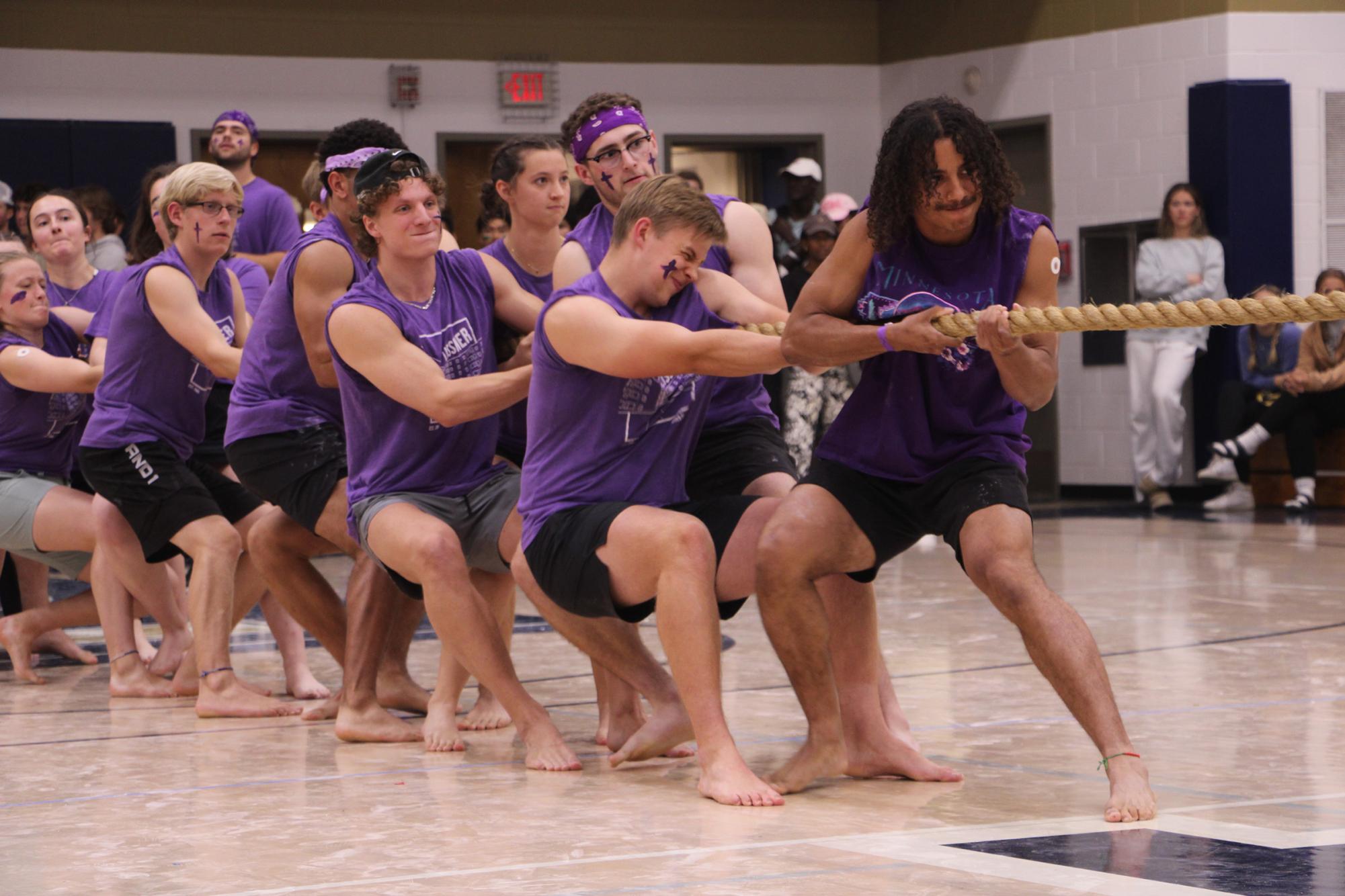 Lissner Hall works together to compete against the other Bethel University dorms during Tug of War, Wednesday Oct. 9, during homecoming week. 