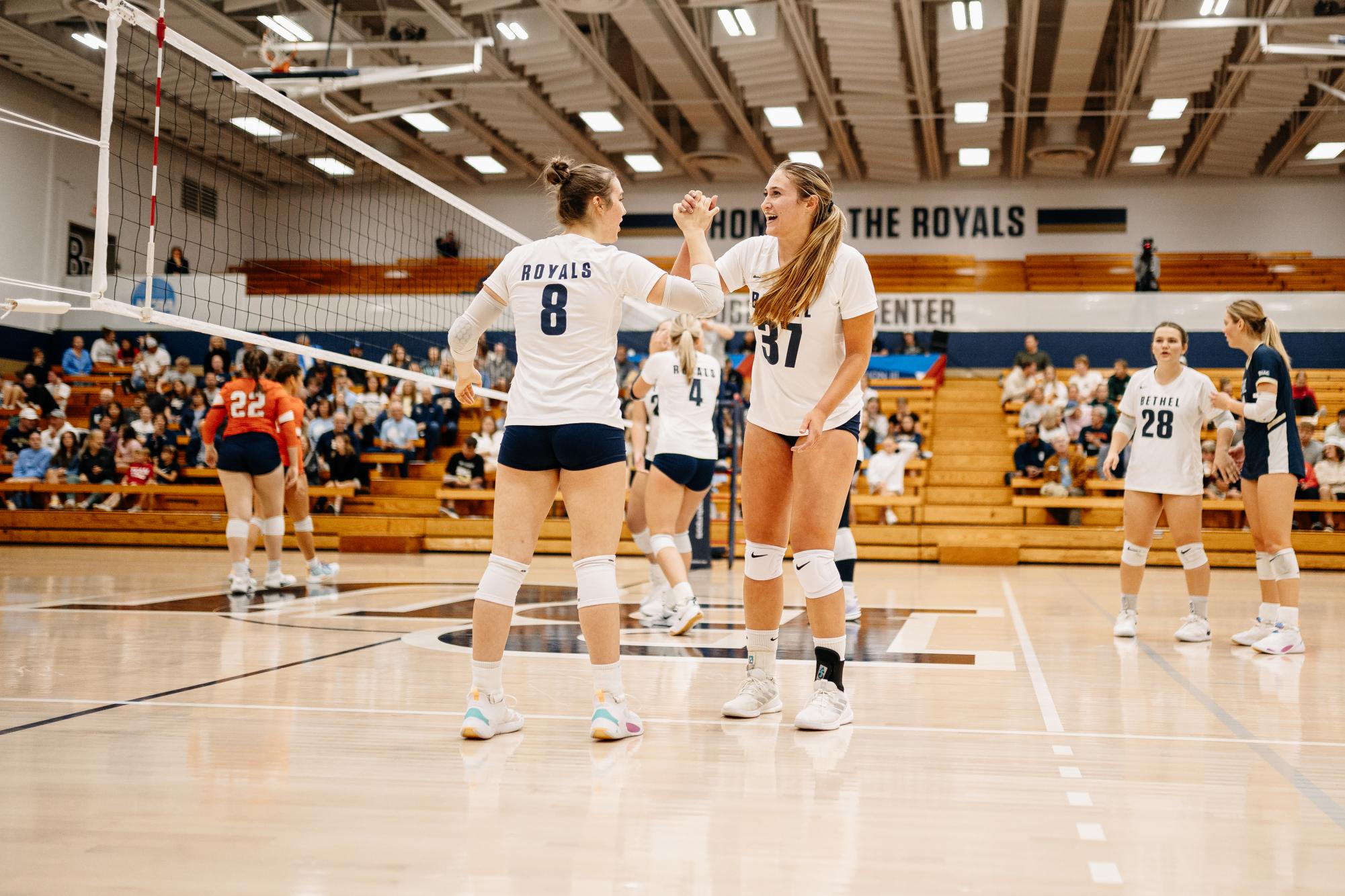 Grace Solberg (37) subs out during Bethel's October 2 matchup against Macalester. She finished Tuesday night's playoff matchup with a career-high 22 kills. 