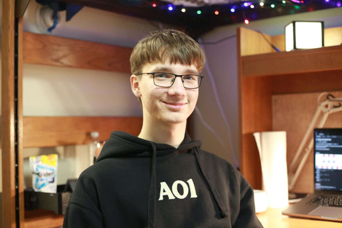 Edgars Yarmolatiy sits in his freshman dorm room in Nelson Hall, a computer coding assignment on his desk behind him. Yarmolatiy is a freshman computer science major at Bethel University and a Ukrainian refugee. He fled his home once for Latvia in February 2022 and again for the United States in April 2023. 