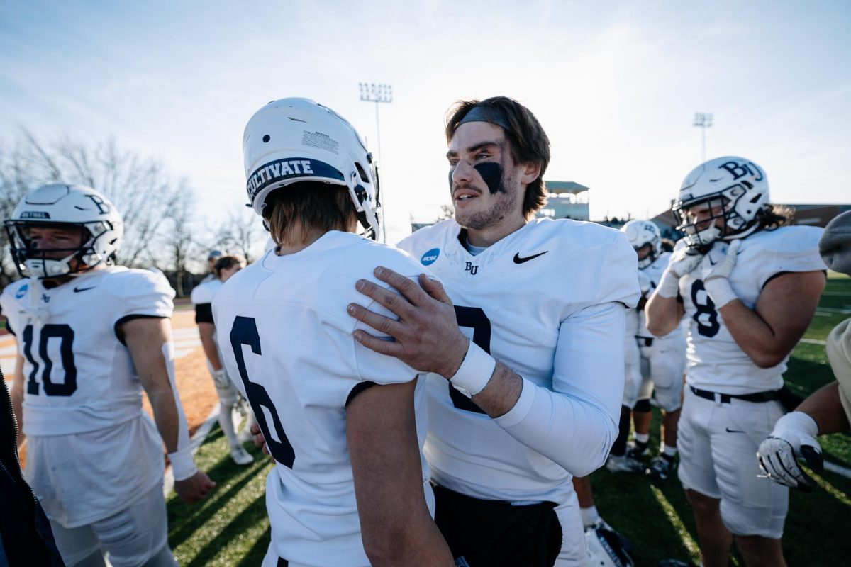 Bethel University sophomore quarterback Cooper Drews and freshman wide receiver Teagan Viebrock embrace each other after a tough 24-21 loss to Susquehanna University in the national quarterfinals Saturday afternoon. The loss knocked the Royals out of the 2024 NCAA Division III playoffs, it’s the third time since 2018 Bethel has seen its season end in the elite eight. 