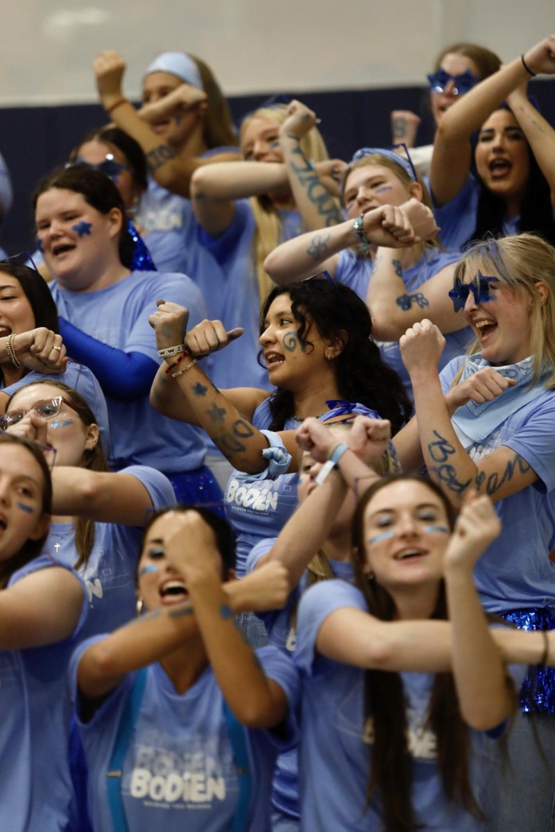 Bodien Hall residents dance during their cheer Oct. 13, 2025, in the Robertson Center gym at Bethel University.