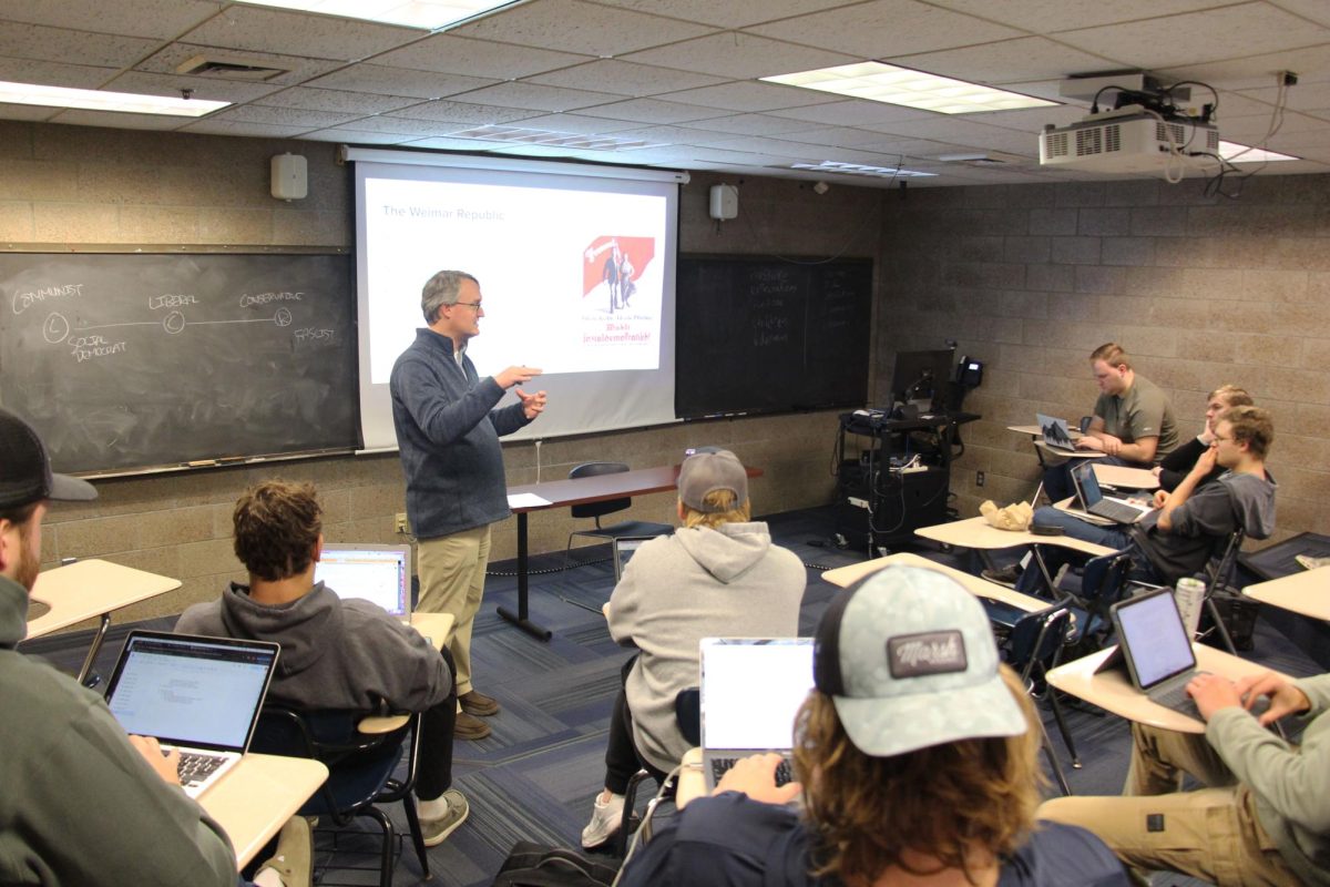 Bethel University history, philosophy and political science professor Chris Gehrz stands in the front of the classroom and lectures to the students in his Modern Europe History class Nov. 7, 2025.