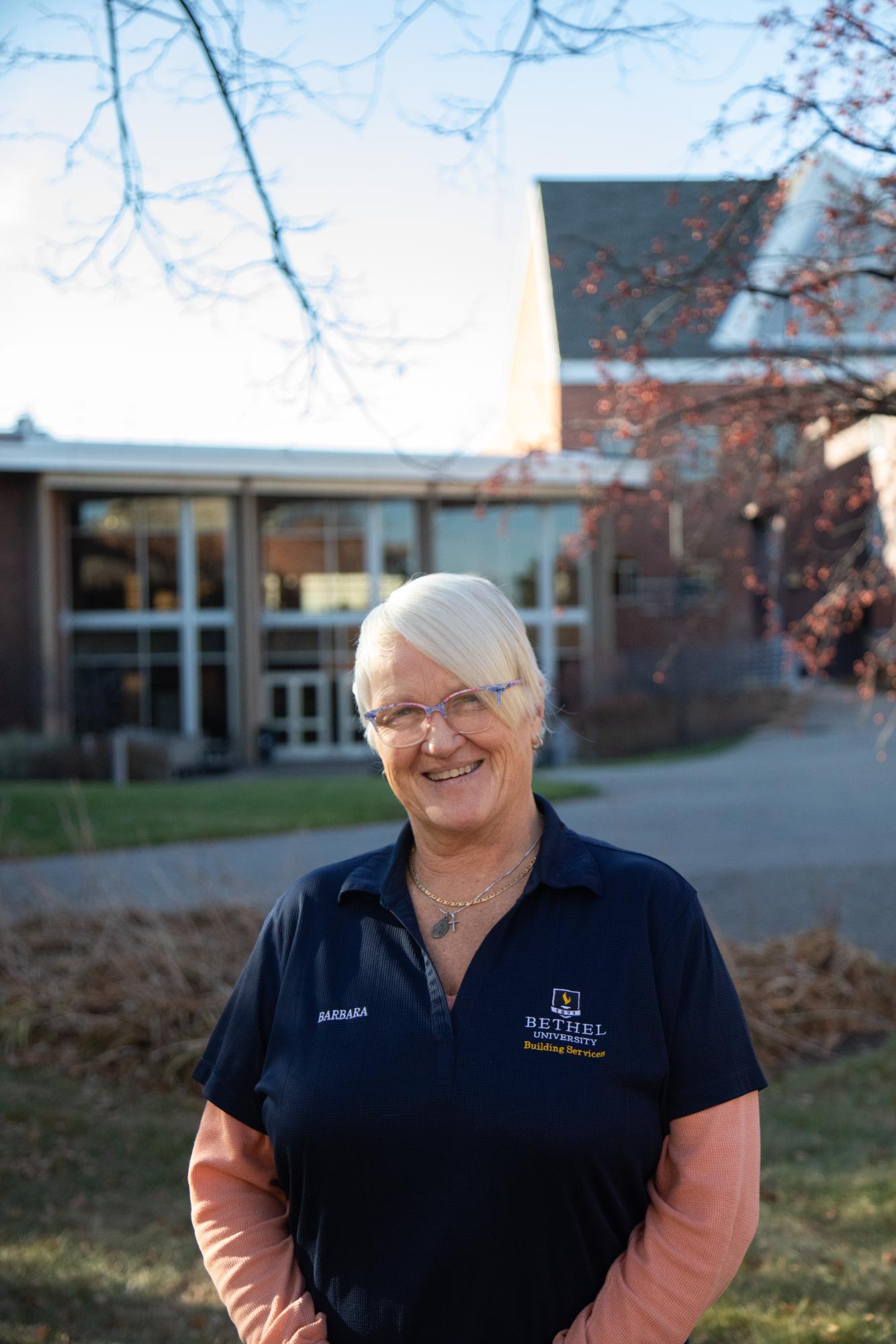 Facilities management worker Barbara Josephs smiles for a portrait outside Bethel University Nov. 21, 2025. 