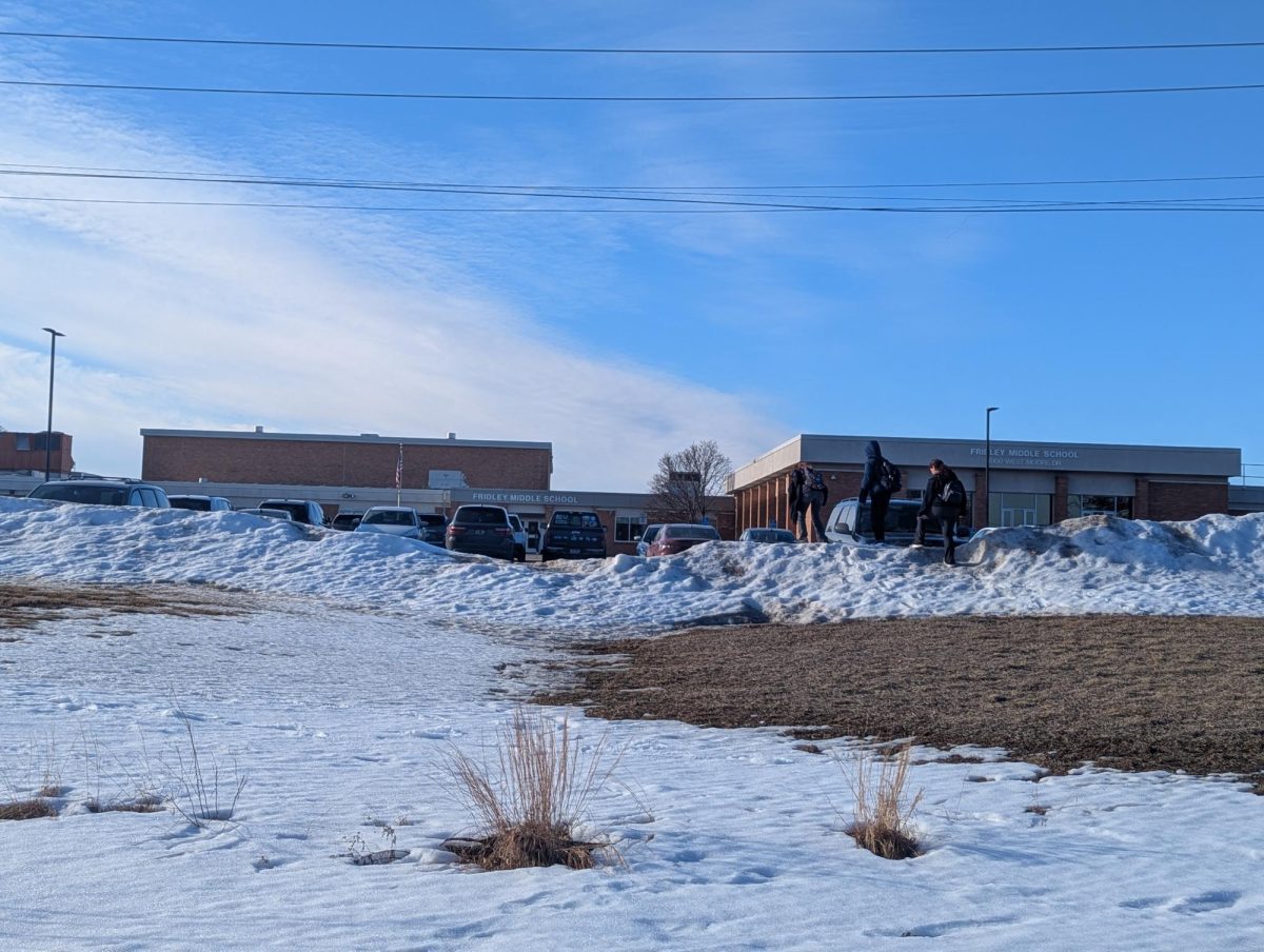 Students walk in front of Fridley Middle School in Fridley, Minnesota, February 13th, 2025. Fridley Public Schools, along with Duluth Public Schools and the state teachers union, are suing the Trump administration to keep federal immigration agents off school property. In Jan. 2025, the Department of Homeland Security rescinded a DHS policy that designated schools as protected areas to be avoided when conducting immigration enforcement. 