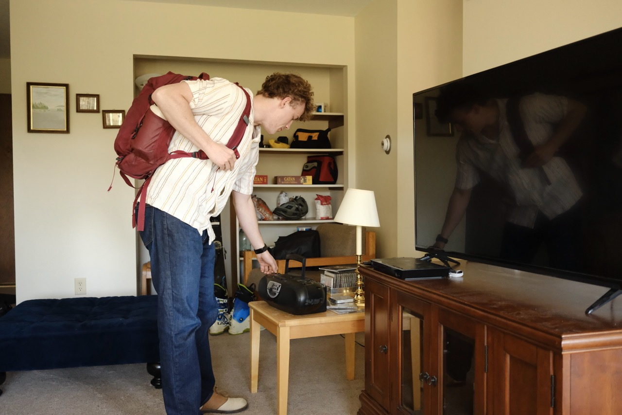 Senior Nicholas Jarman presses play on his stereo in North Village April 24, 2026. Jarman began listening to CDs and cassette tapes on the stereo this semester. “All of this probably ties back to just, I always want to be on my phone less,” Jarman said.